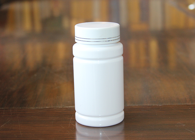 100cc瓷白瓶白色塑料盖 高度：90mm  直径：46mm