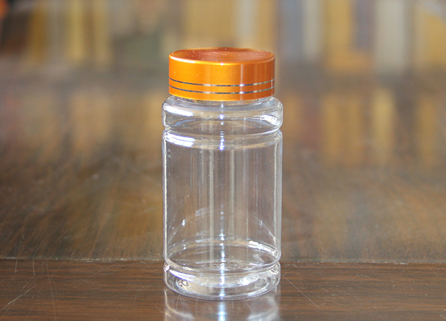 100cc透明瓶仿金盖 高度：90mm  直径：46mm