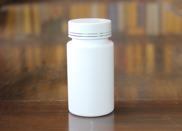 100-2cc瓷白瓶白色塑料盖 高度：90mm  直径：45mm